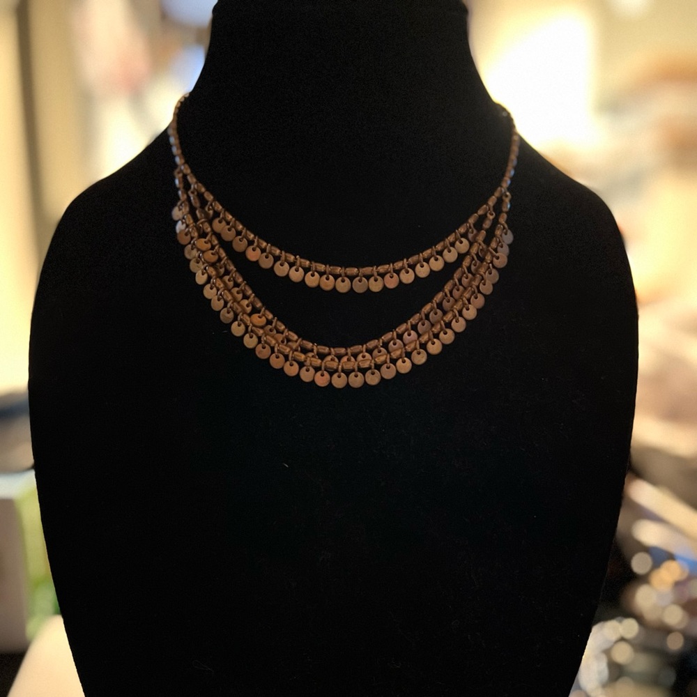Gold tone bib necklace